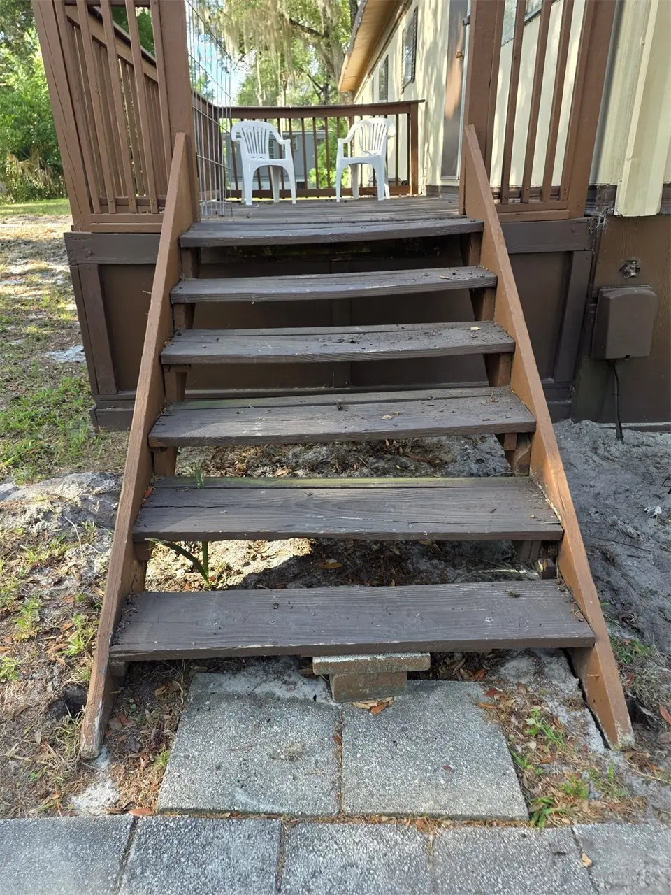 Existing narrow deck stairs before replacement