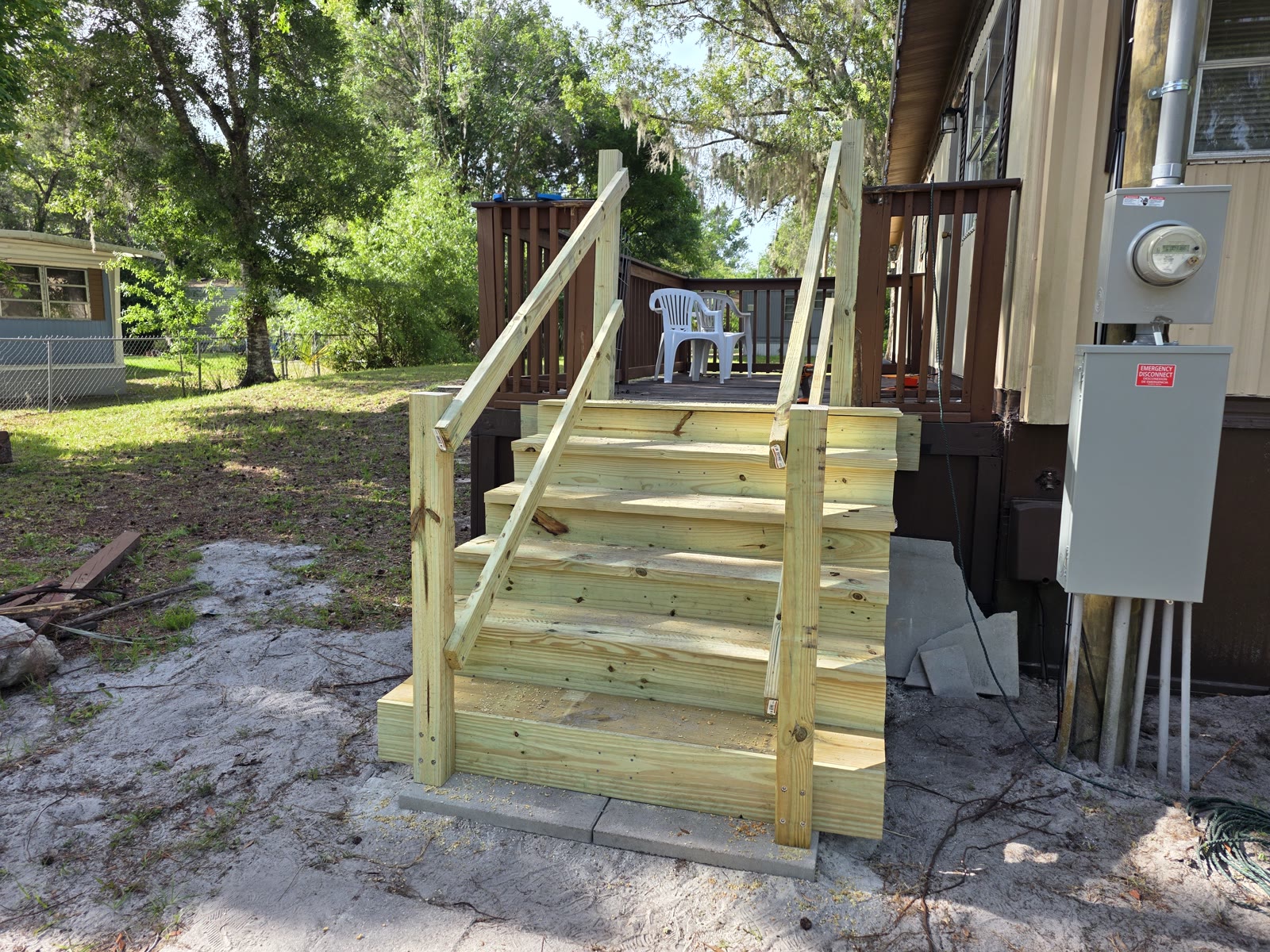 Deck stairs and handrails under construction