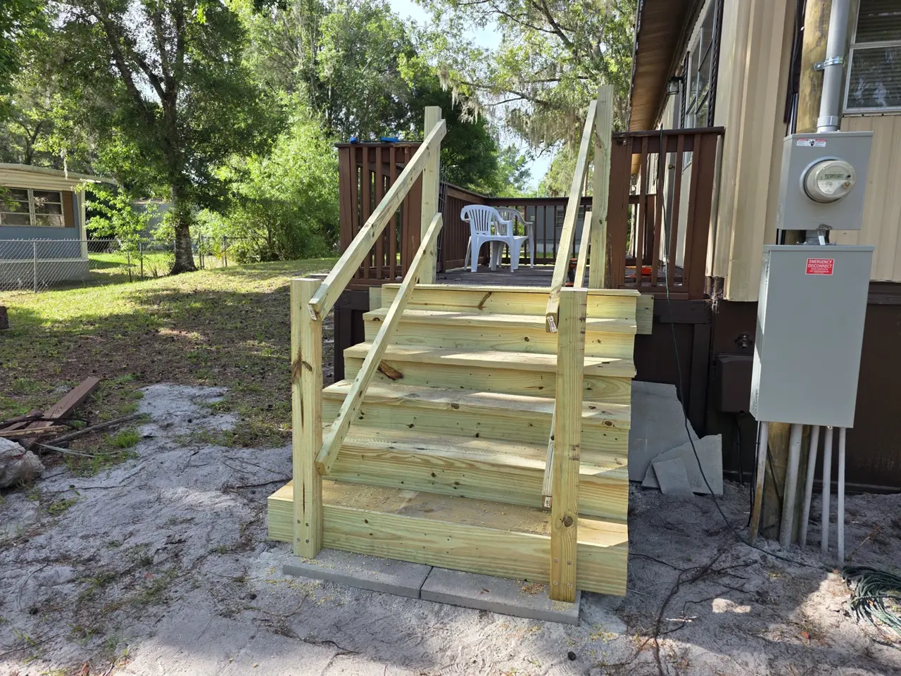 Deck stairs and handrails under construction