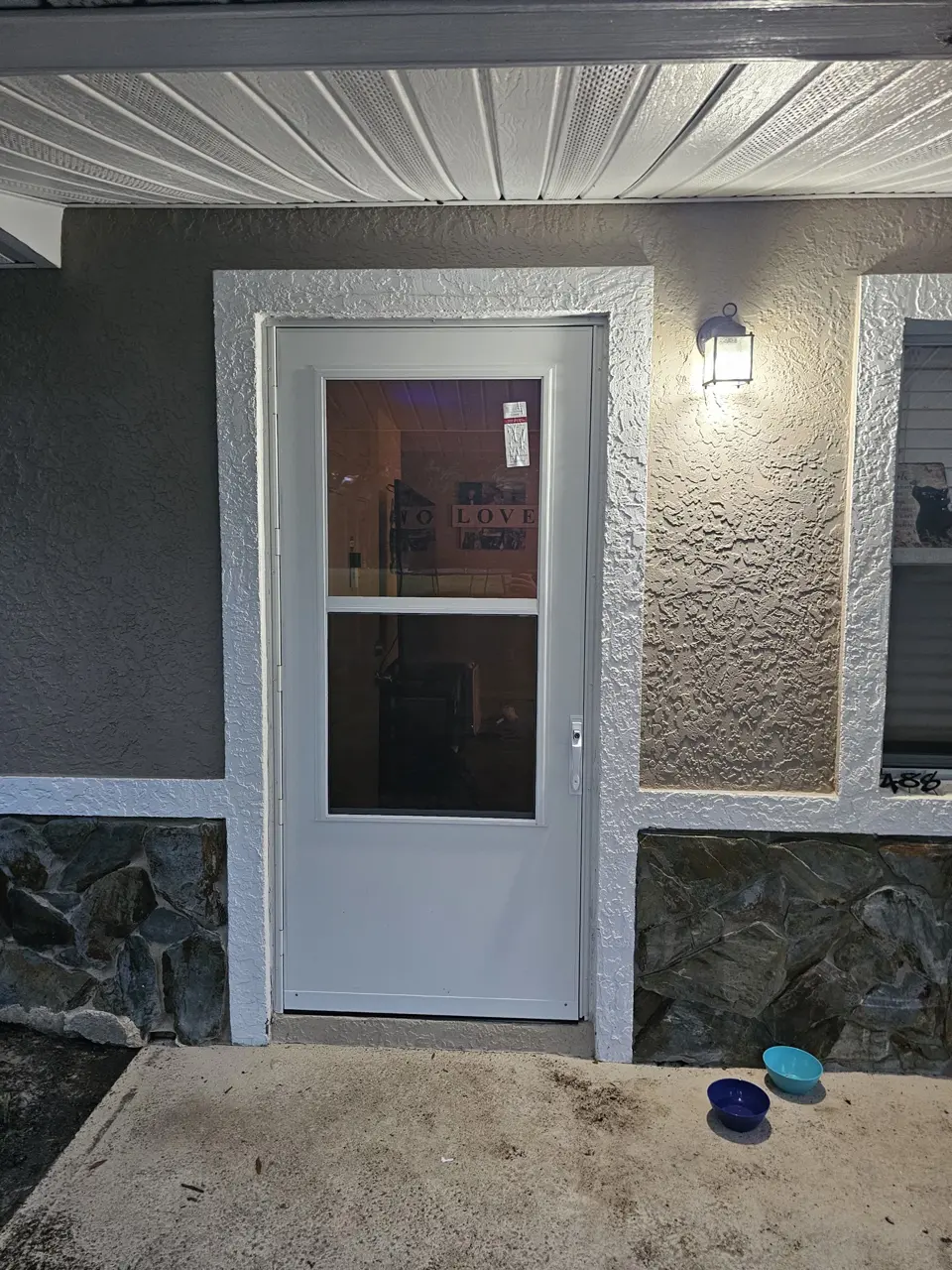 Finished exterior door and painted entry from an iFIXED project